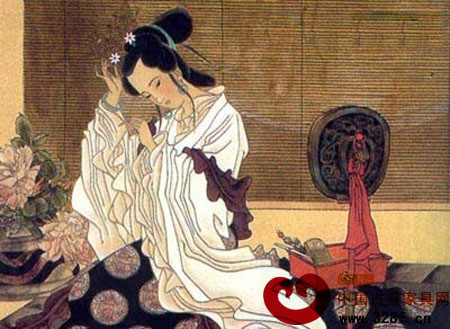 對鏡貼花黃